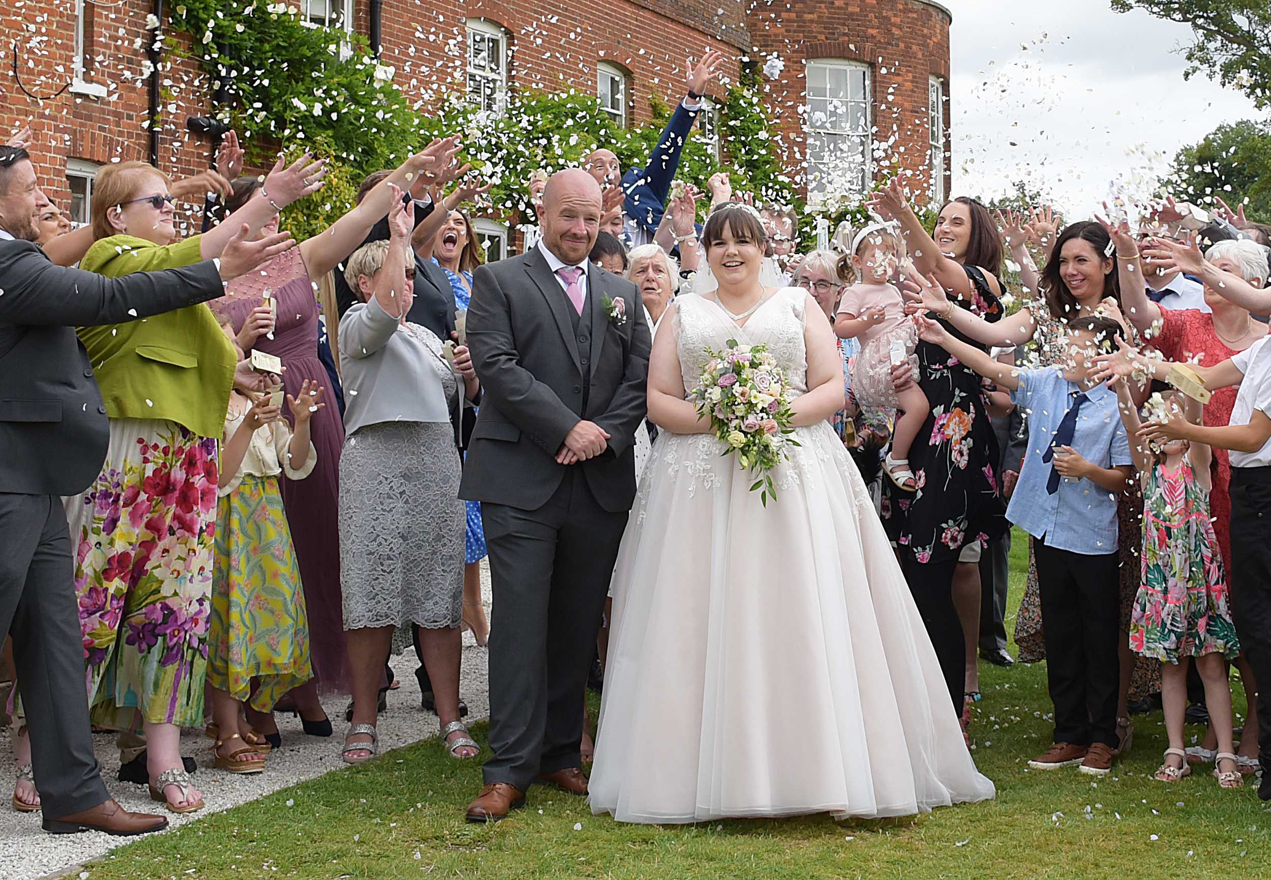 funny confetti photo stoke place wedding photographer