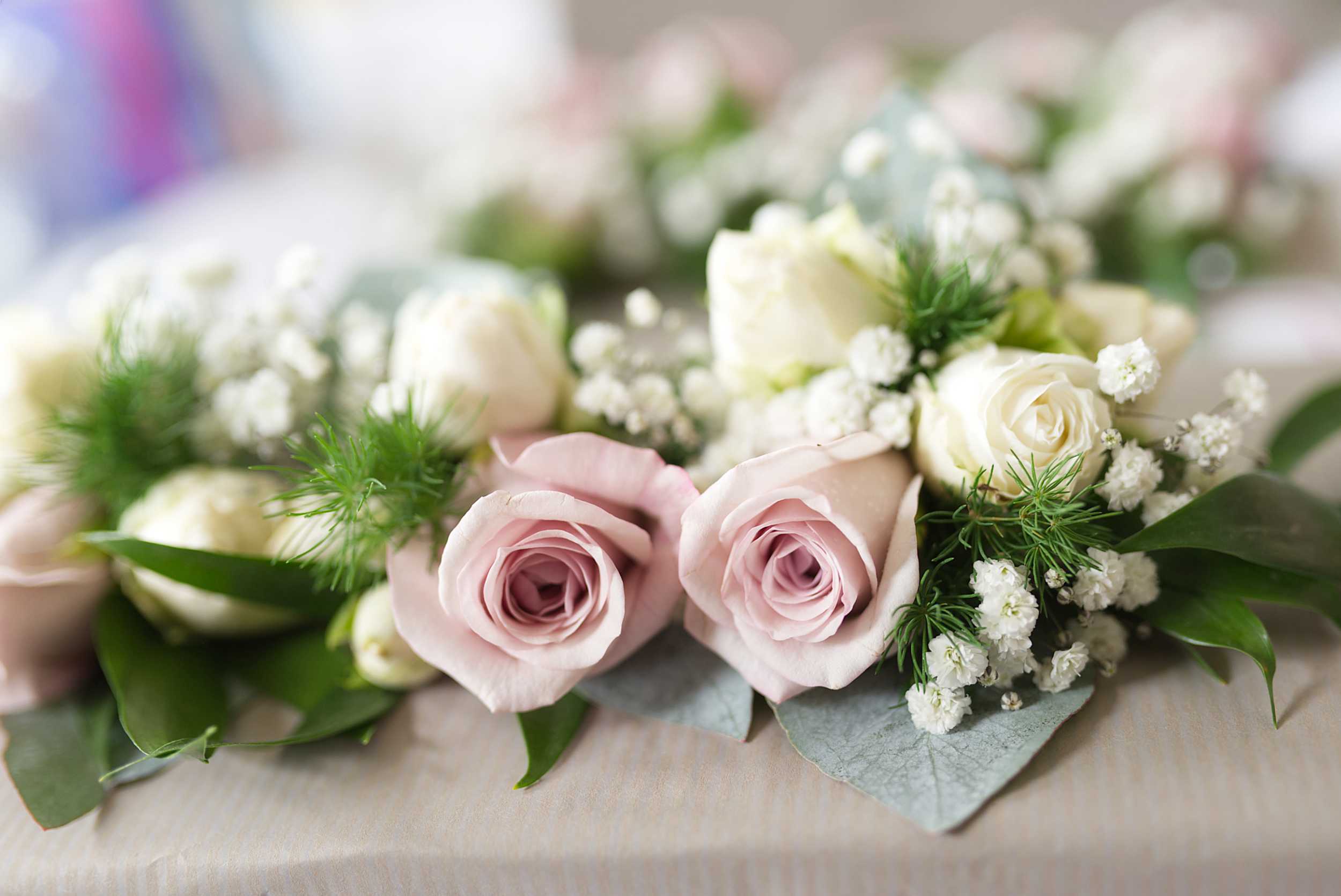 Logo elements ARROWS copyright Nadina Bee wedding buttonholes in cream and pink roses by Berkshire wedding photographer Nadina Bee for blog saving money on your wedding