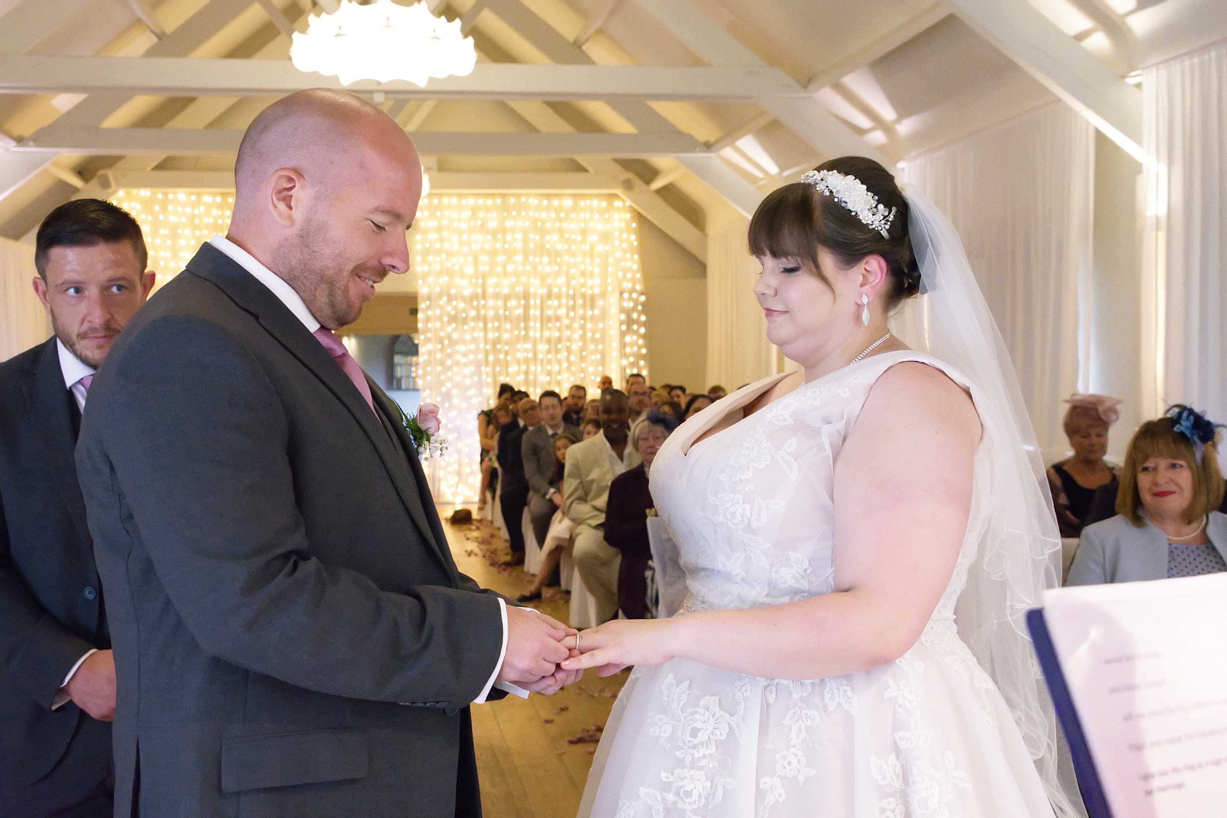 exchanging the rings Stoke Place wedding