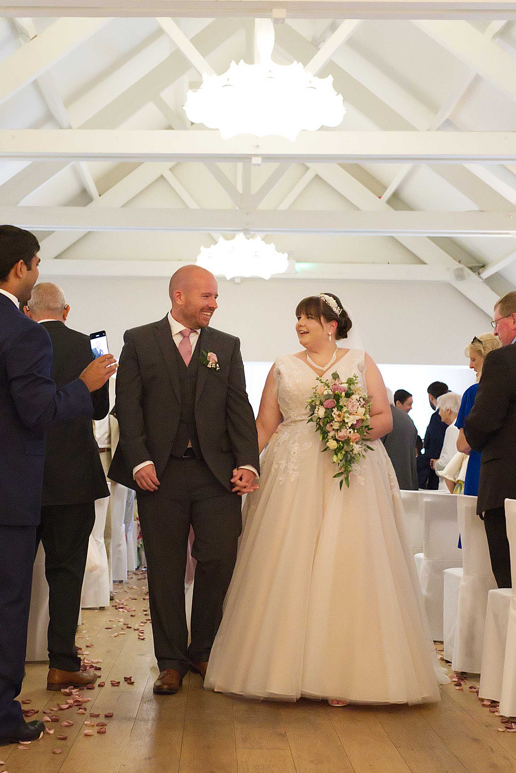 Stoke Place Wedding walking down the aisle