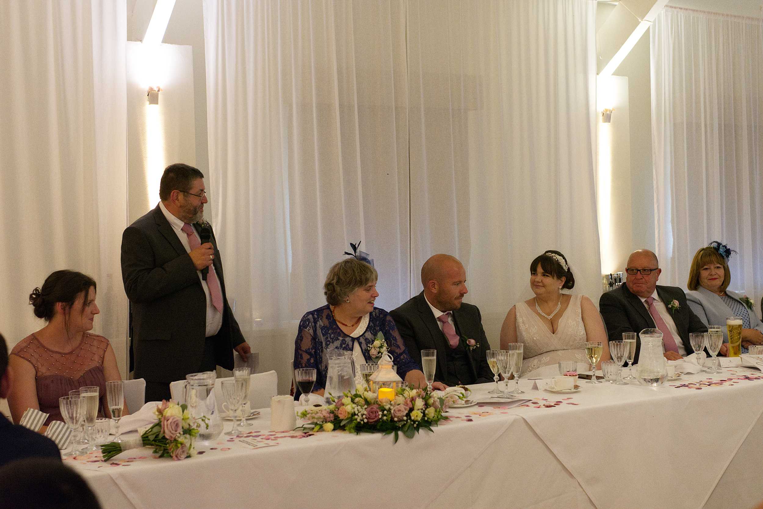 manhug for the groom natural wedding photography stoke place