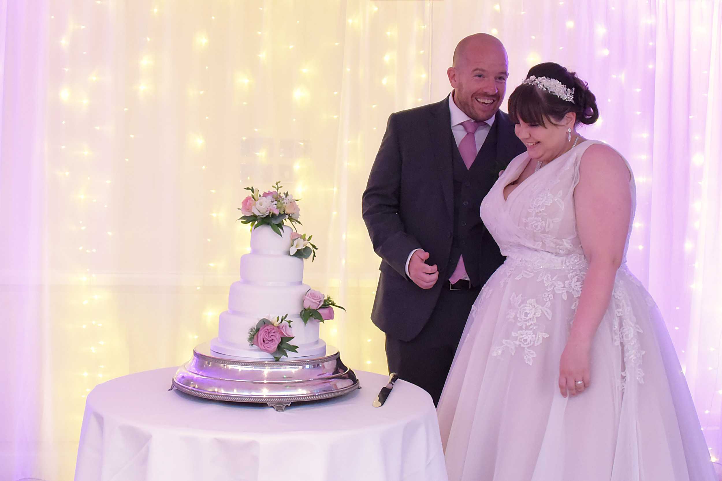 white wedding cake with real flowers Stoke Place Wedding Photographer Berkshire