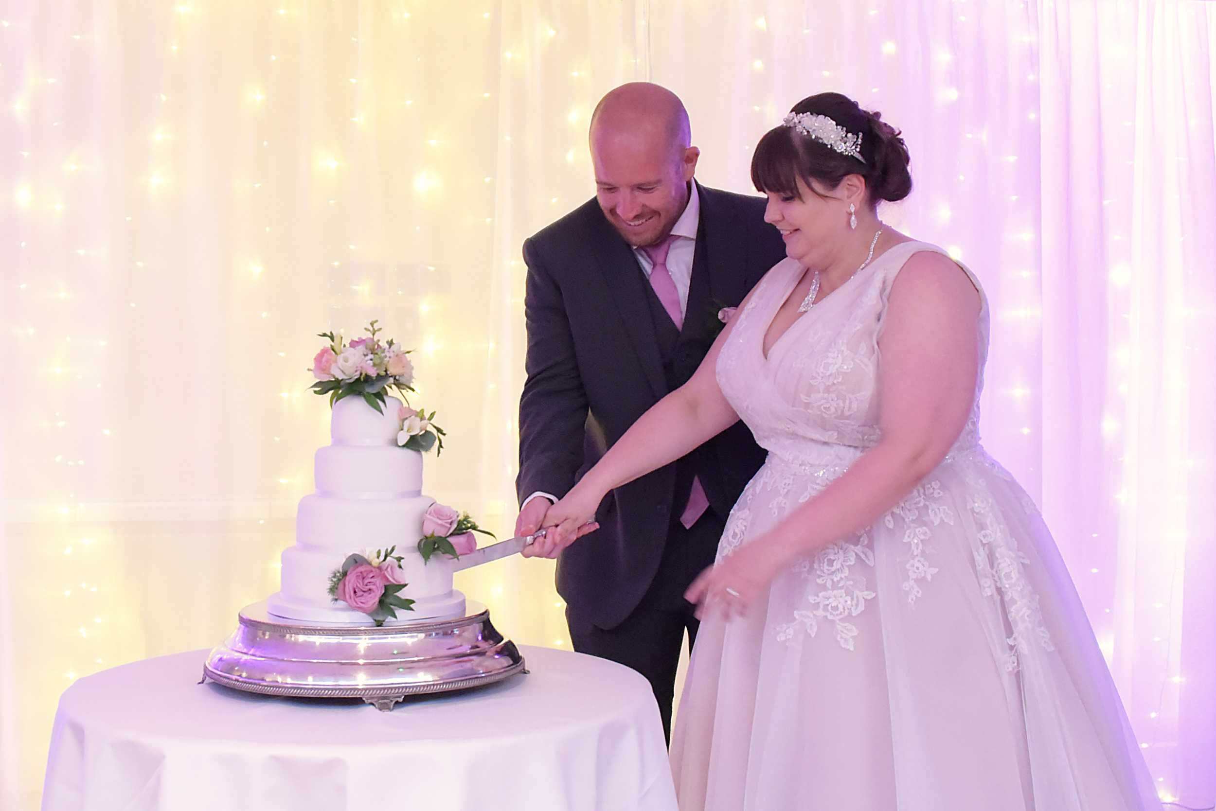 white wedding cake with real flowers Stoke Place Wedding Photographer Berkshire