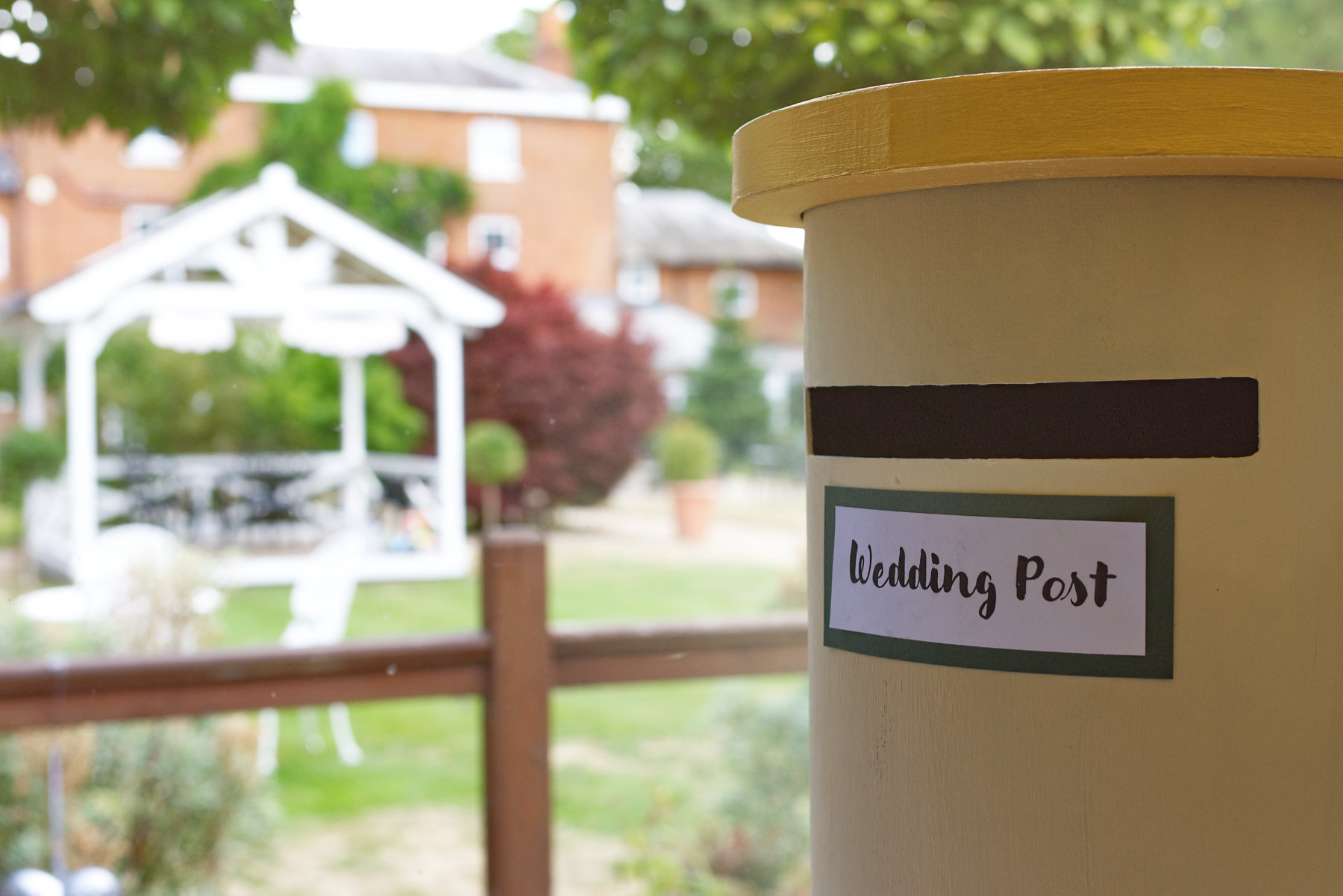 Logo elements ARROWS copyright Nadina Bee Wedding Post Box with the Mill House gardens in Reading Berkshire in the background by Nadina Bee, for blog: HOW SHOULD YOUR PHOTOGRAPHER DELIVER YOUR WEDDING PHOTOS?